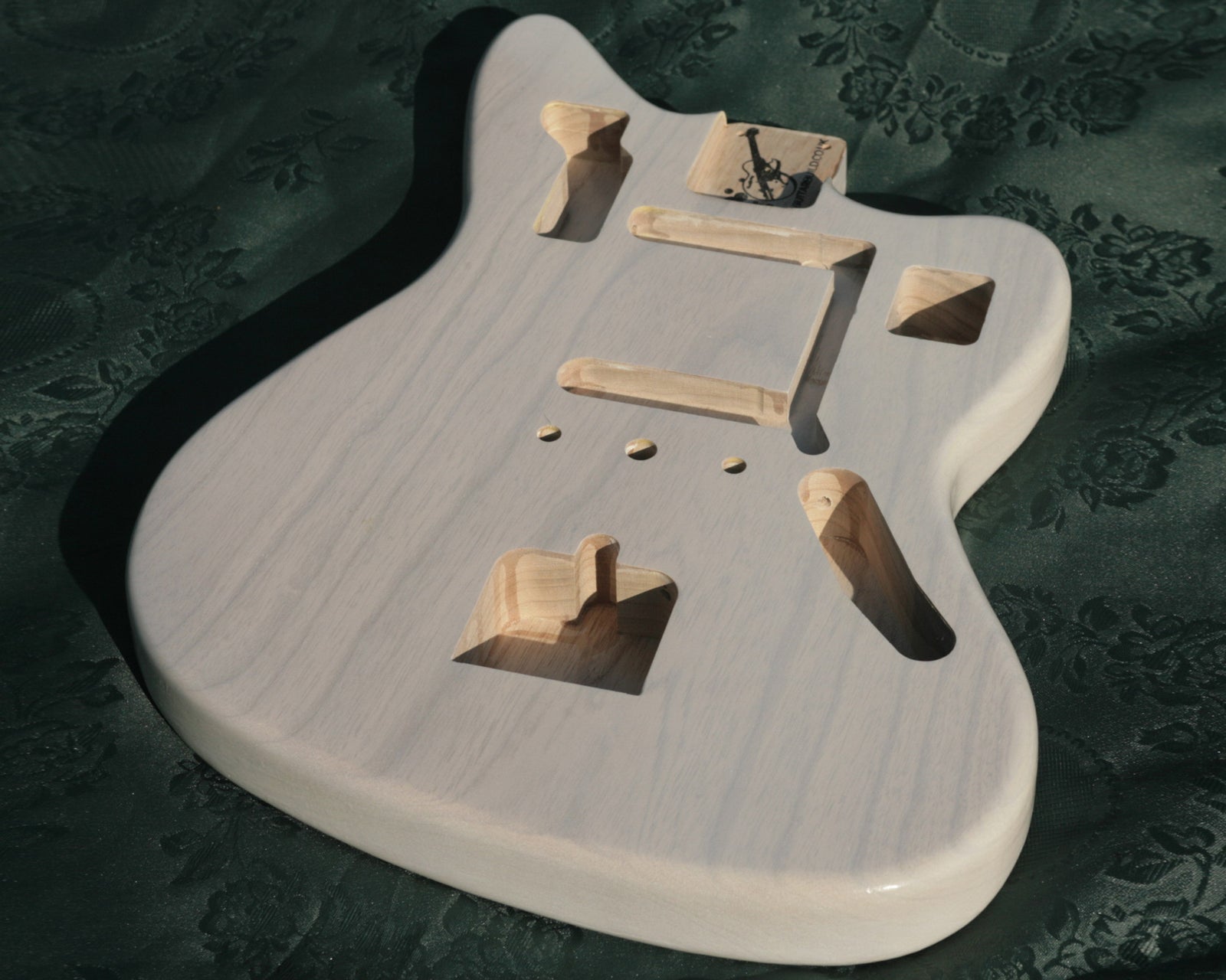 Nitrocellulose finishing a vintage correct Jaguar